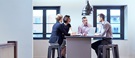 En gruppe mennesker i samtale rundt et bord